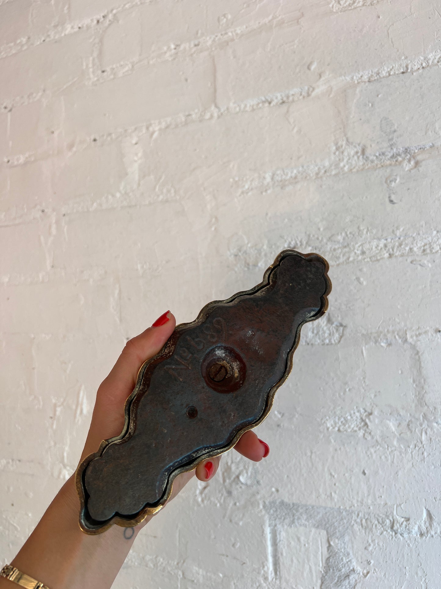 WEIGHTED BRASS SHELL DOOR STOP