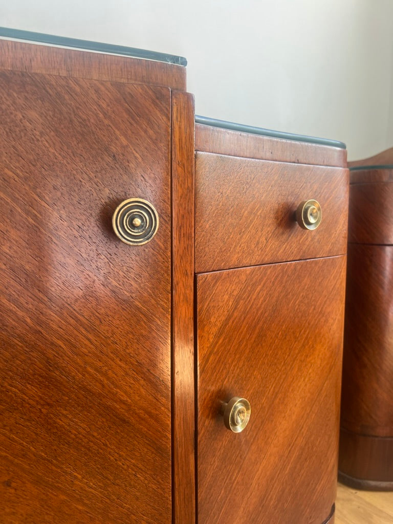 A stunning pair of curved art deco walnut bedside tables