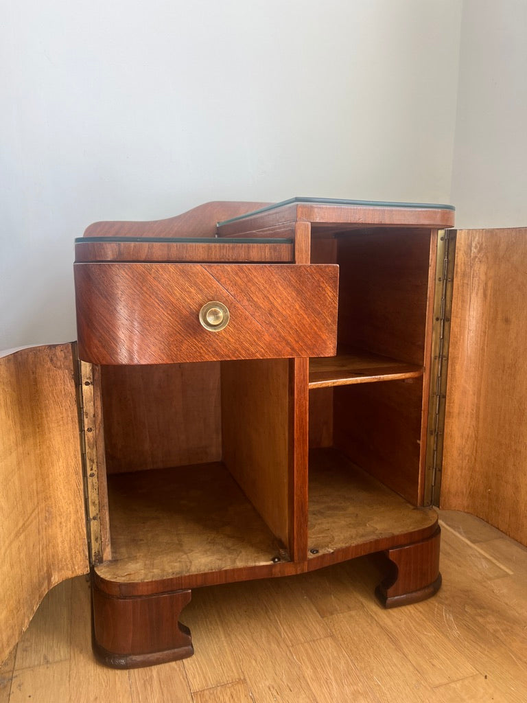 A stunning pair of curved art deco walnut bedside tables