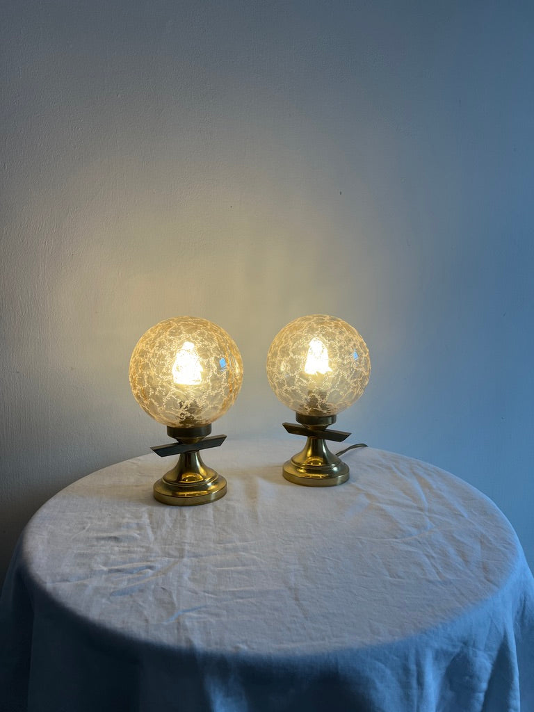 PAIR OF BRASS AND GLASS BALL TABLE LAMPS