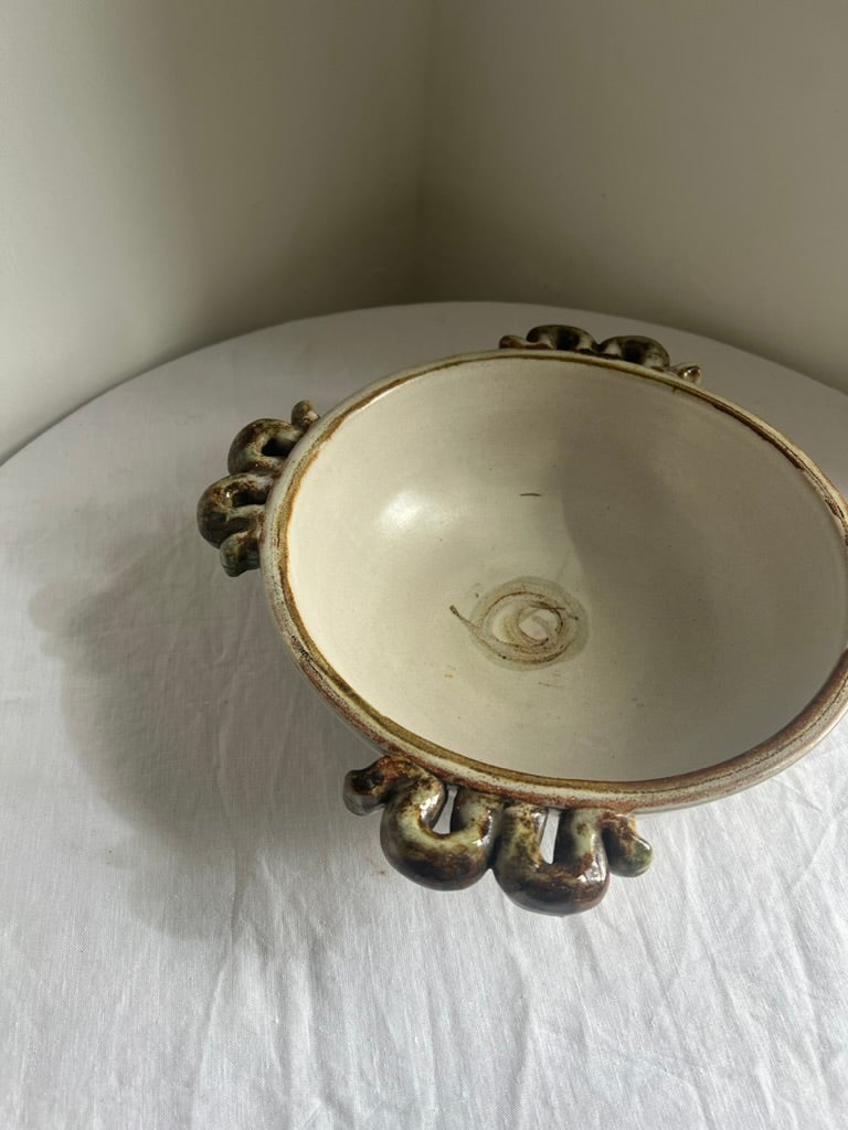 Ceramic serving bowl with wiggle handles, by Denby