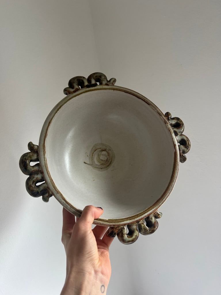 Ceramic serving bowl with wiggle handles, by Denby