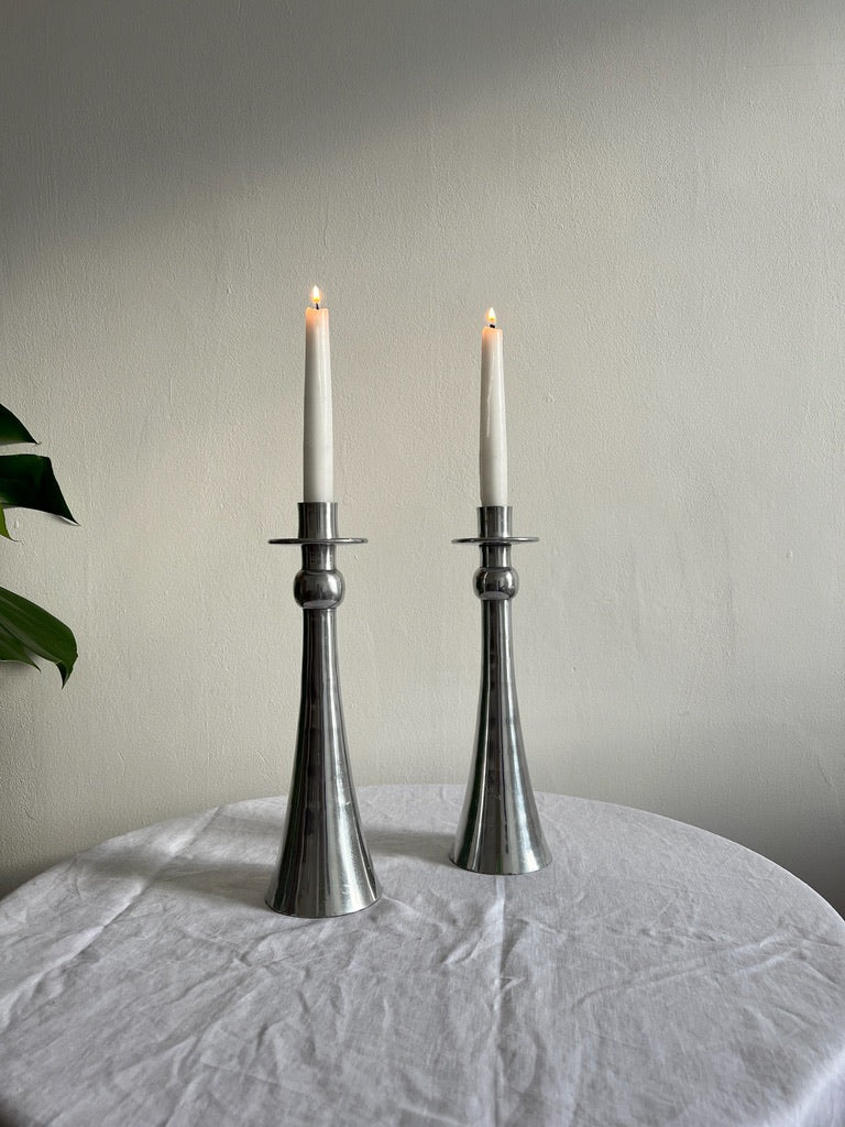 Vintage tall silver candlesticks with scooped bottom and dripping trays