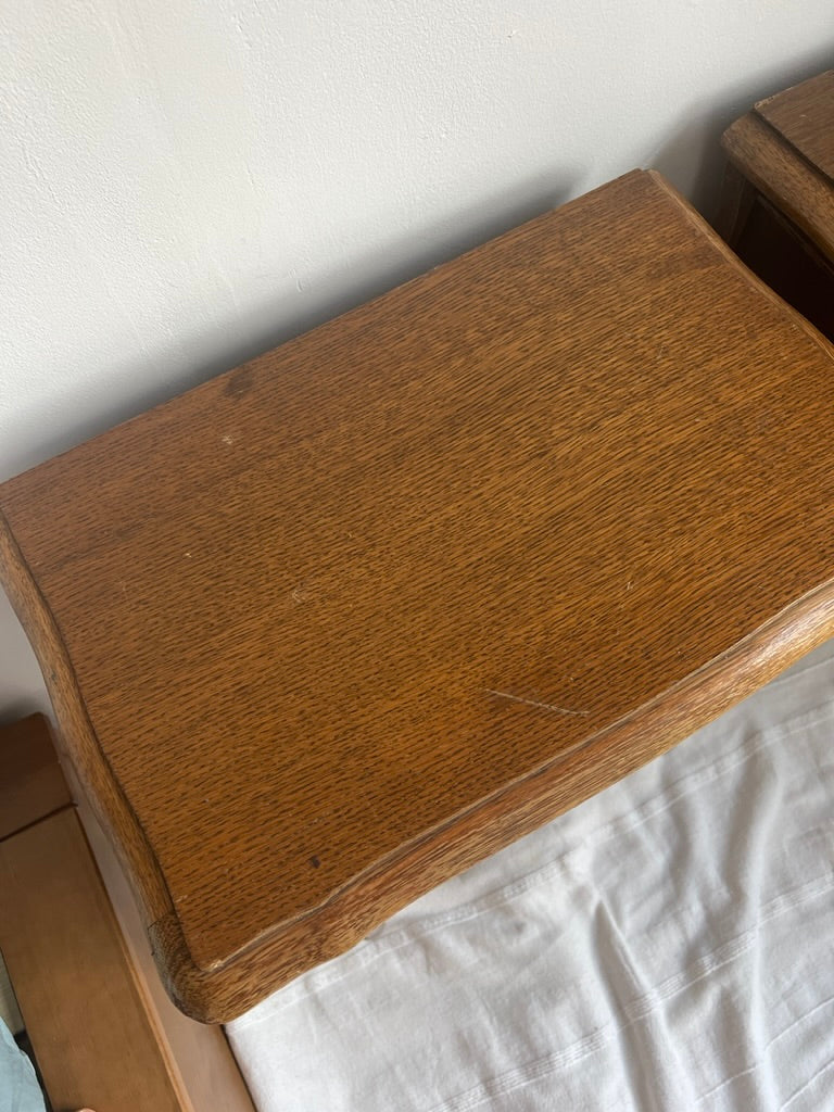 Pair of French matching oak bedside tables with drawers