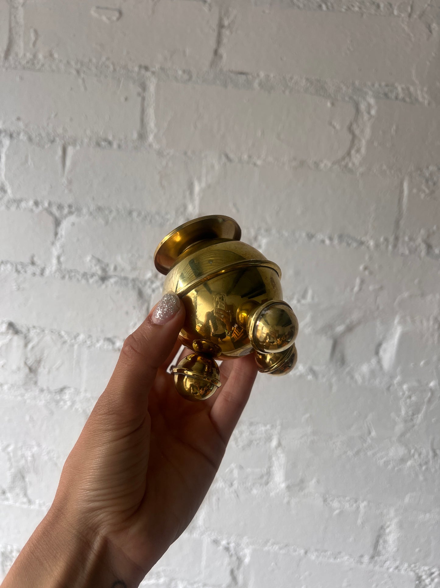 PAIR OF SMALL BRASS SPHERE CANDLE HOLDERS