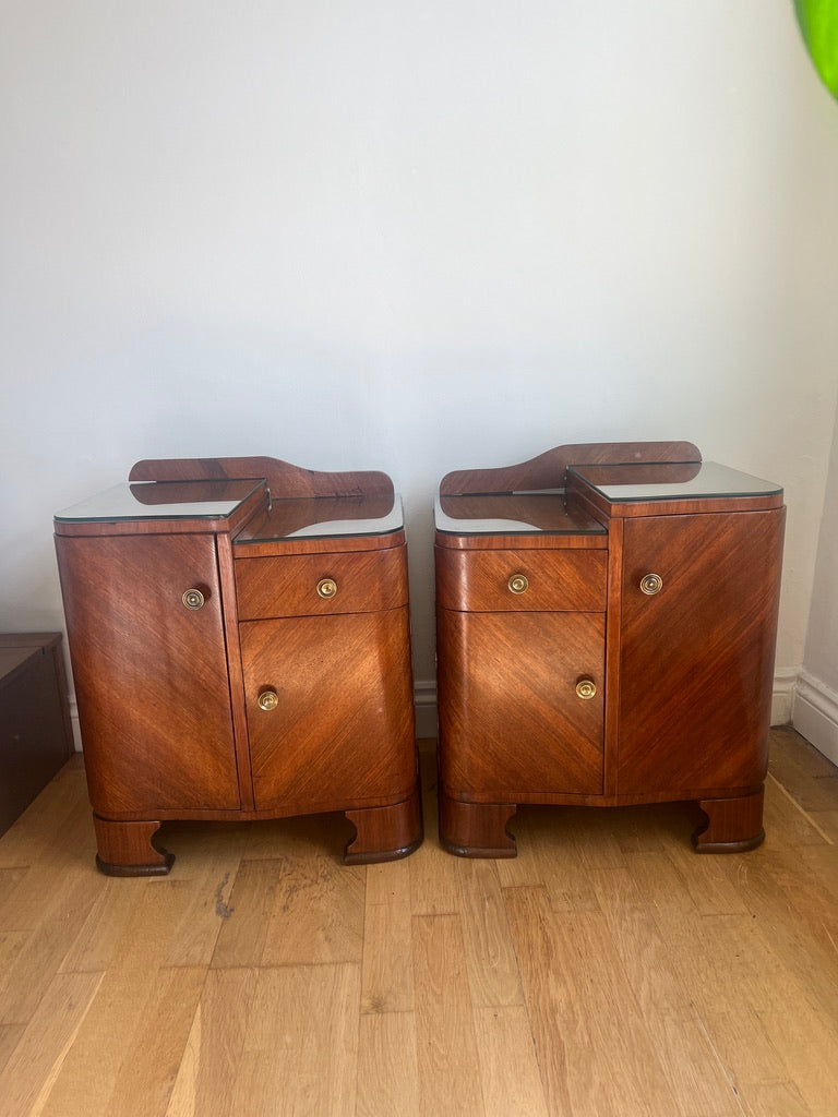 A stunning pair of curved art deco walnut bedside tables