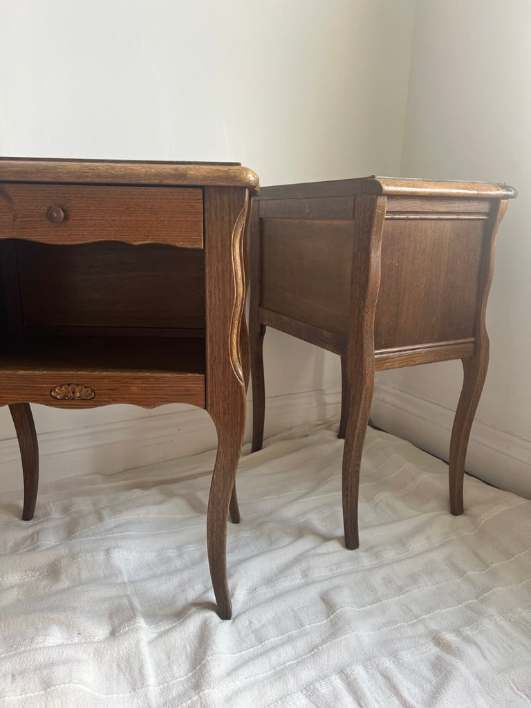 Pair of French matching oak bedside tables with drawers