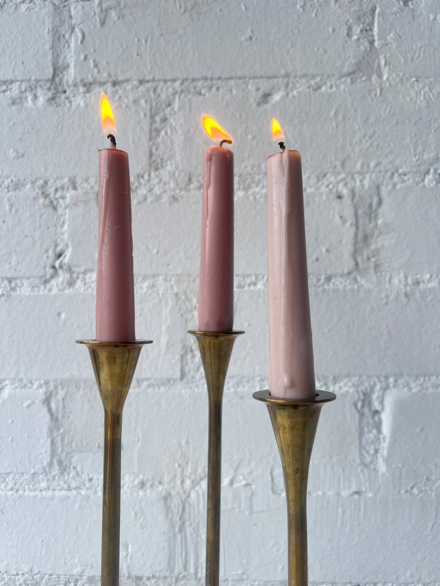 TRIO OF BRASS CANDLE HOLDERS