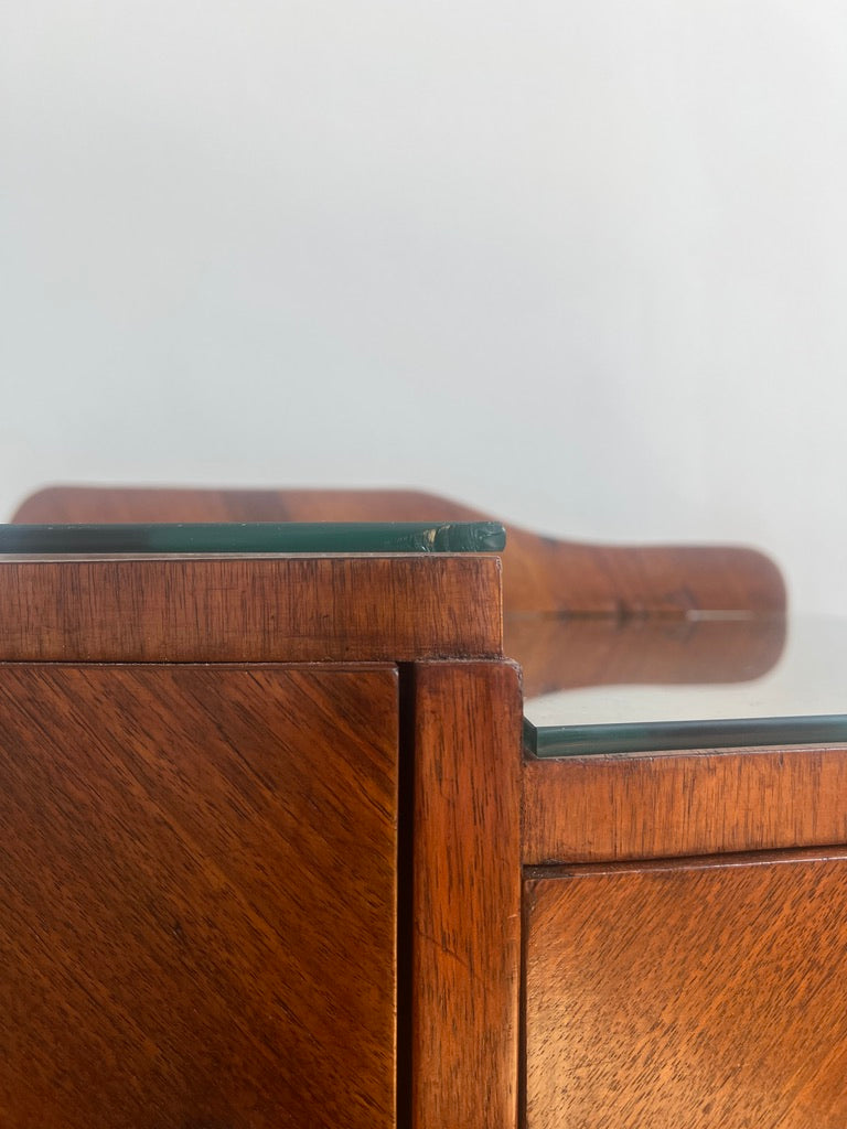 A stunning pair of curved art deco walnut bedside tables