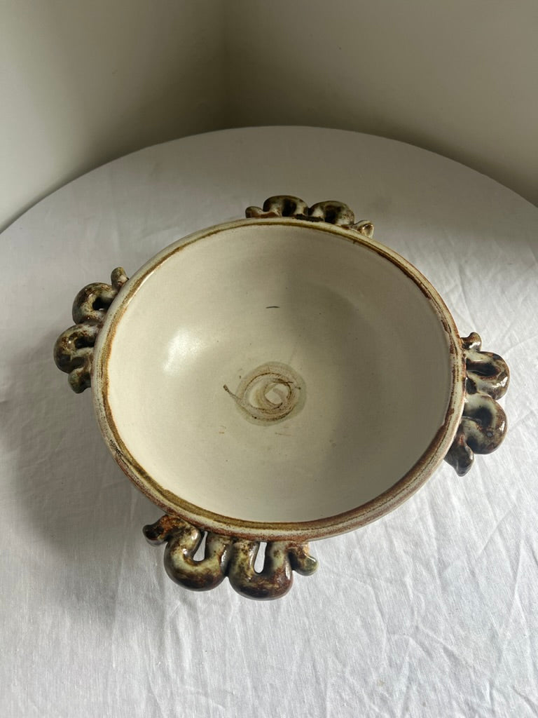 Ceramic serving bowl with wiggle handles, by Denby