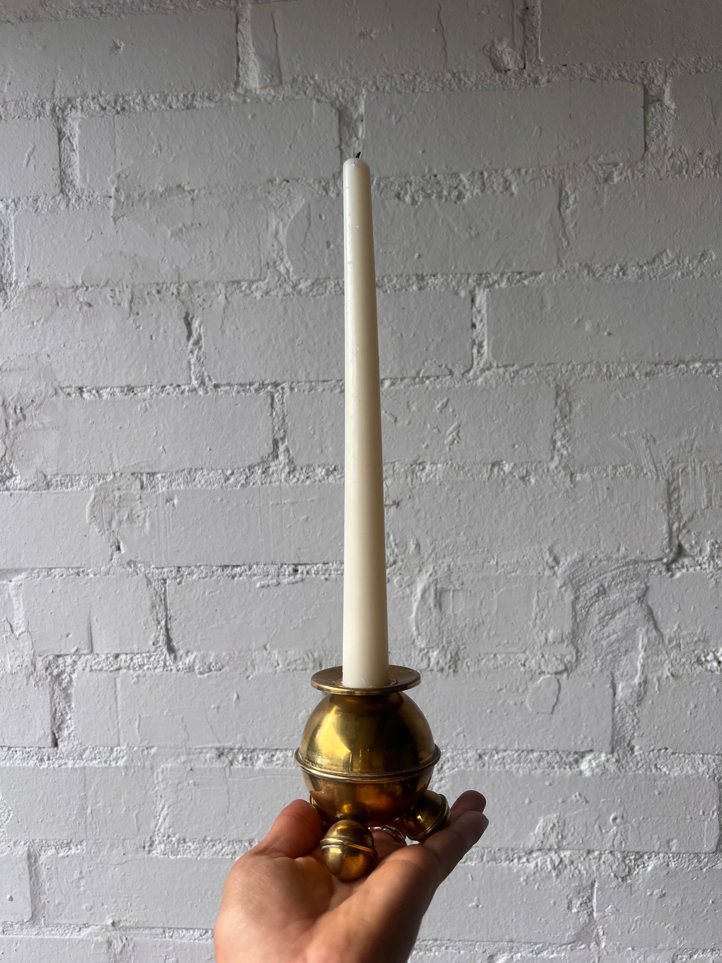 PAIR OF SMALL BRASS SPHERE CANDLE HOLDERS
