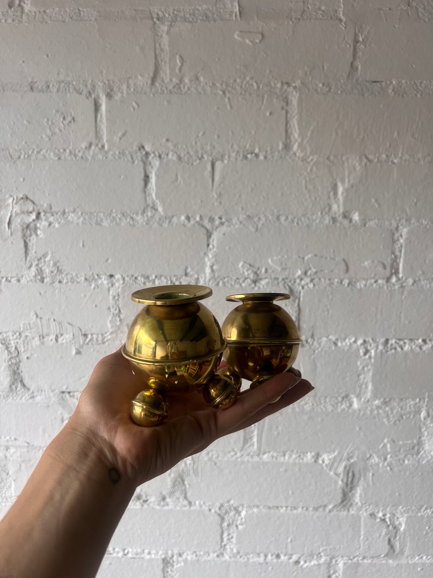 PAIR OF SMALL BRASS SPHERE CANDLE HOLDERS