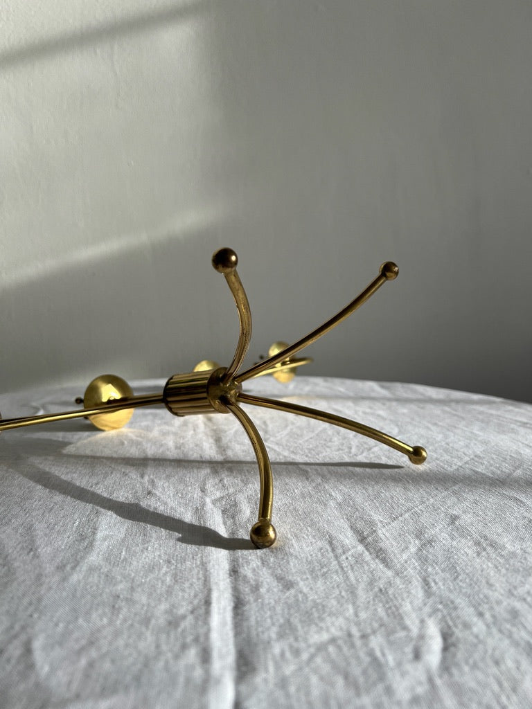 Swedish brass five arm candelabra on ball feet
