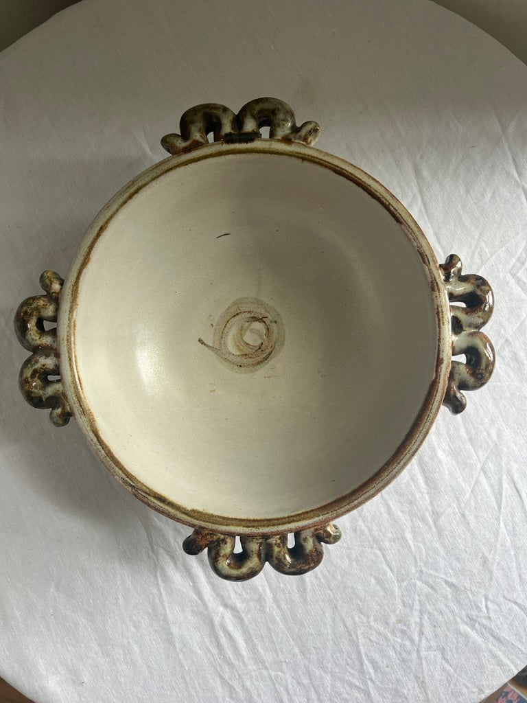 Ceramic serving bowl with wiggle handles, by Denby