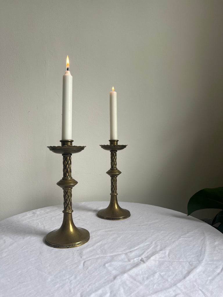 Pair of vintage tall brass candle sticks