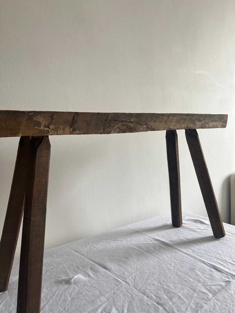 Rustic wooden narrow four leg bench