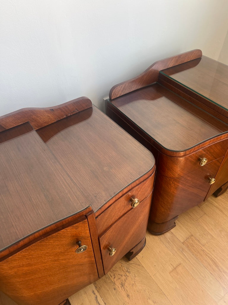 A stunning pair of curved art deco walnut bedside tables
