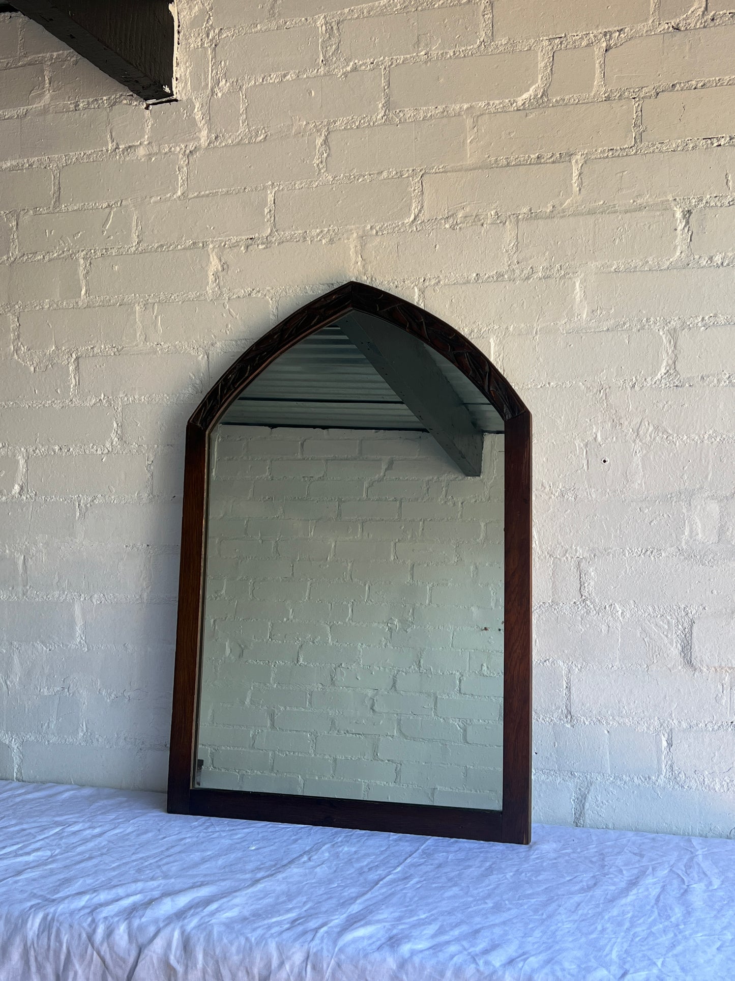 ARCHED CARVED MIRROR
