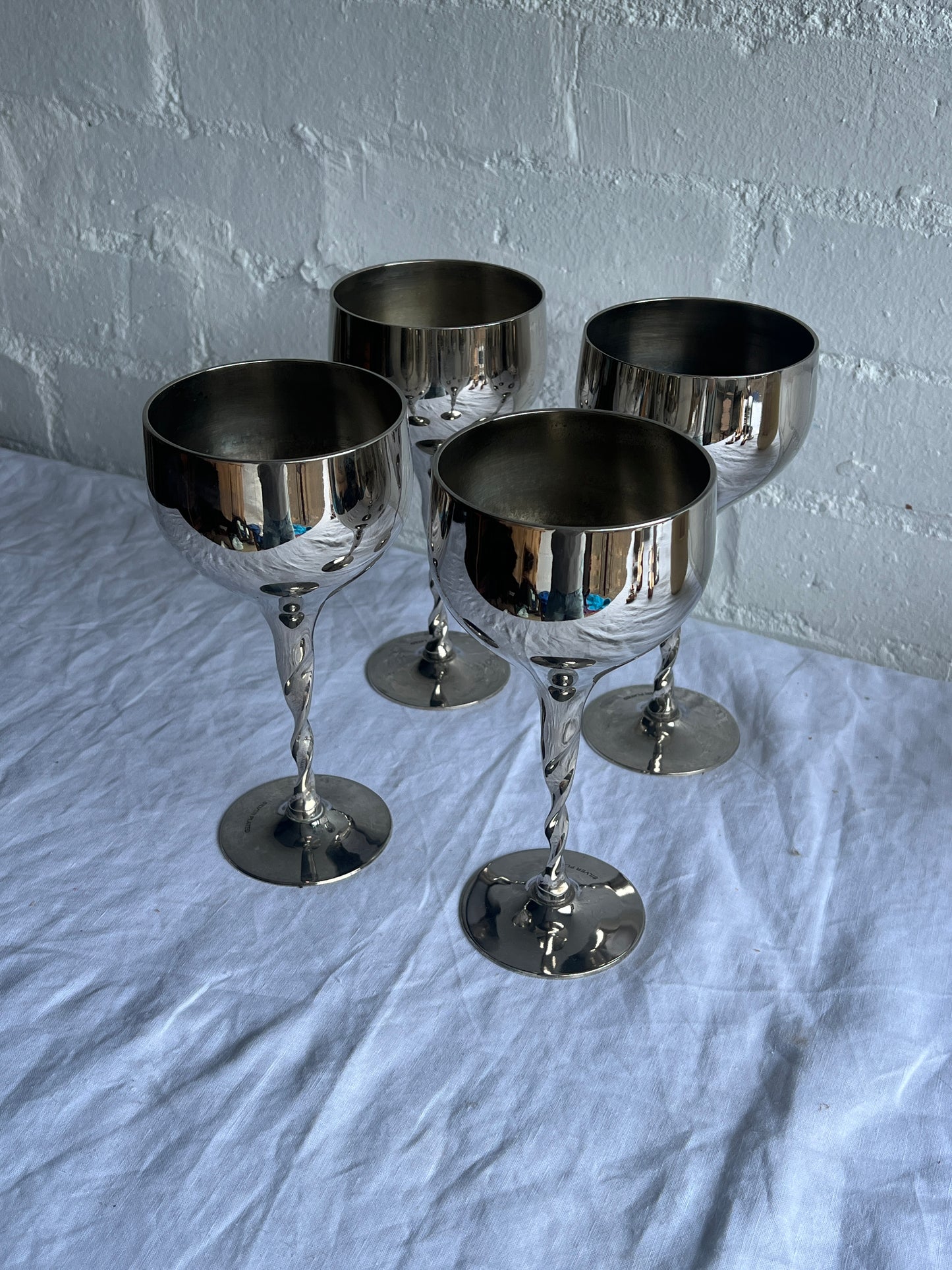 SET OF FOUR SILVER TWISTED GOBLETS