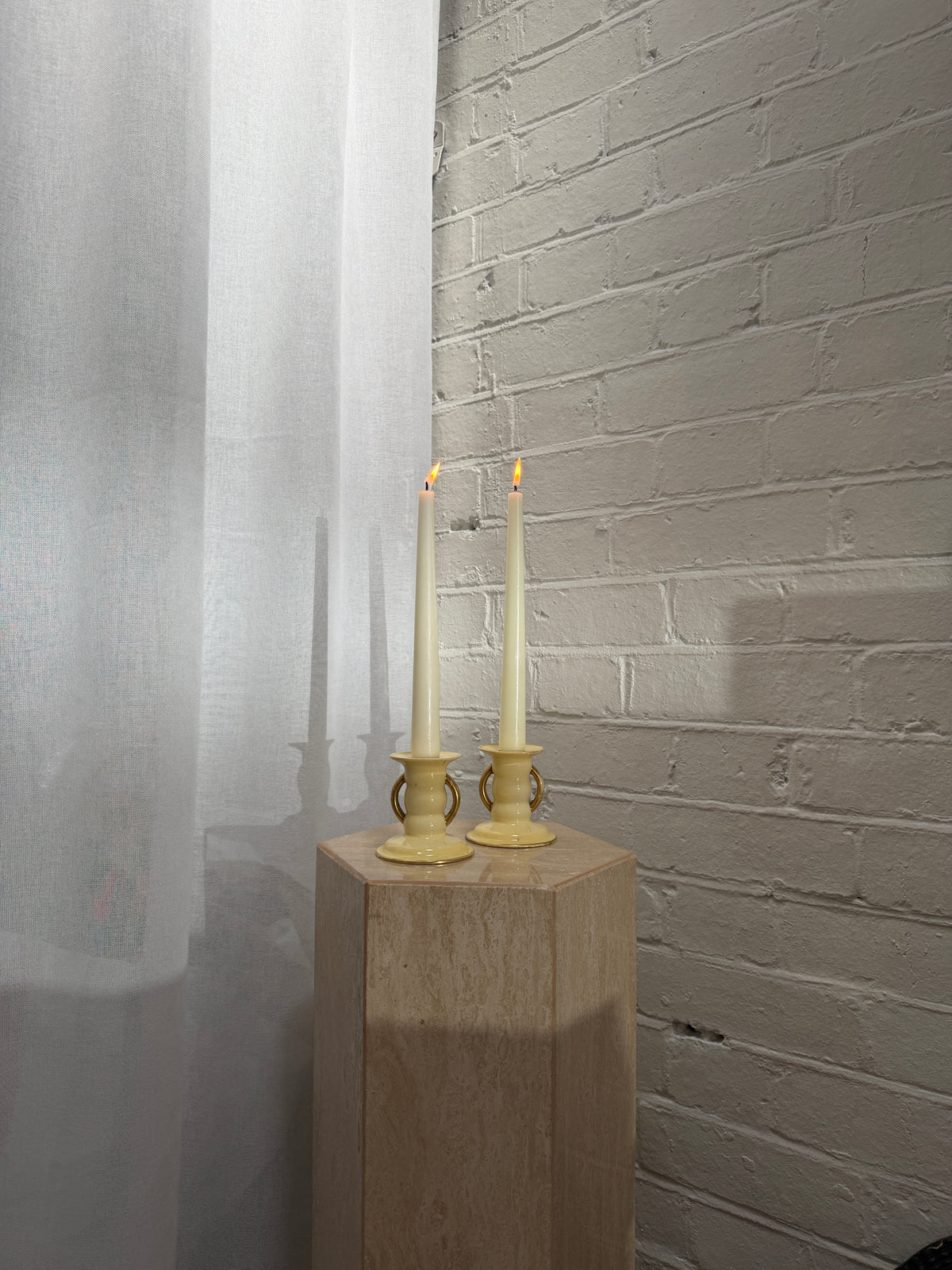 PAIR OF YELLOW CANDLE HOLDERS