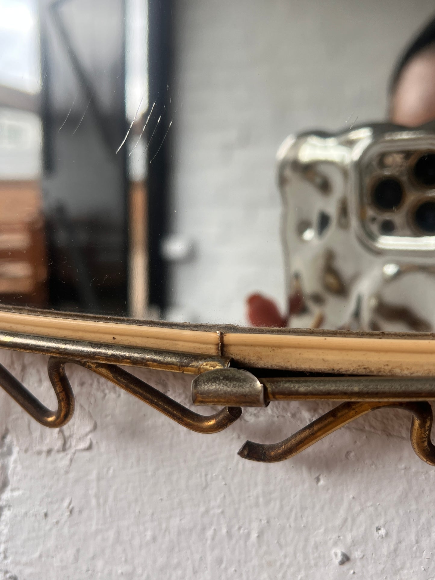 MID CENTURY BRASS WIGGLE MIRROR