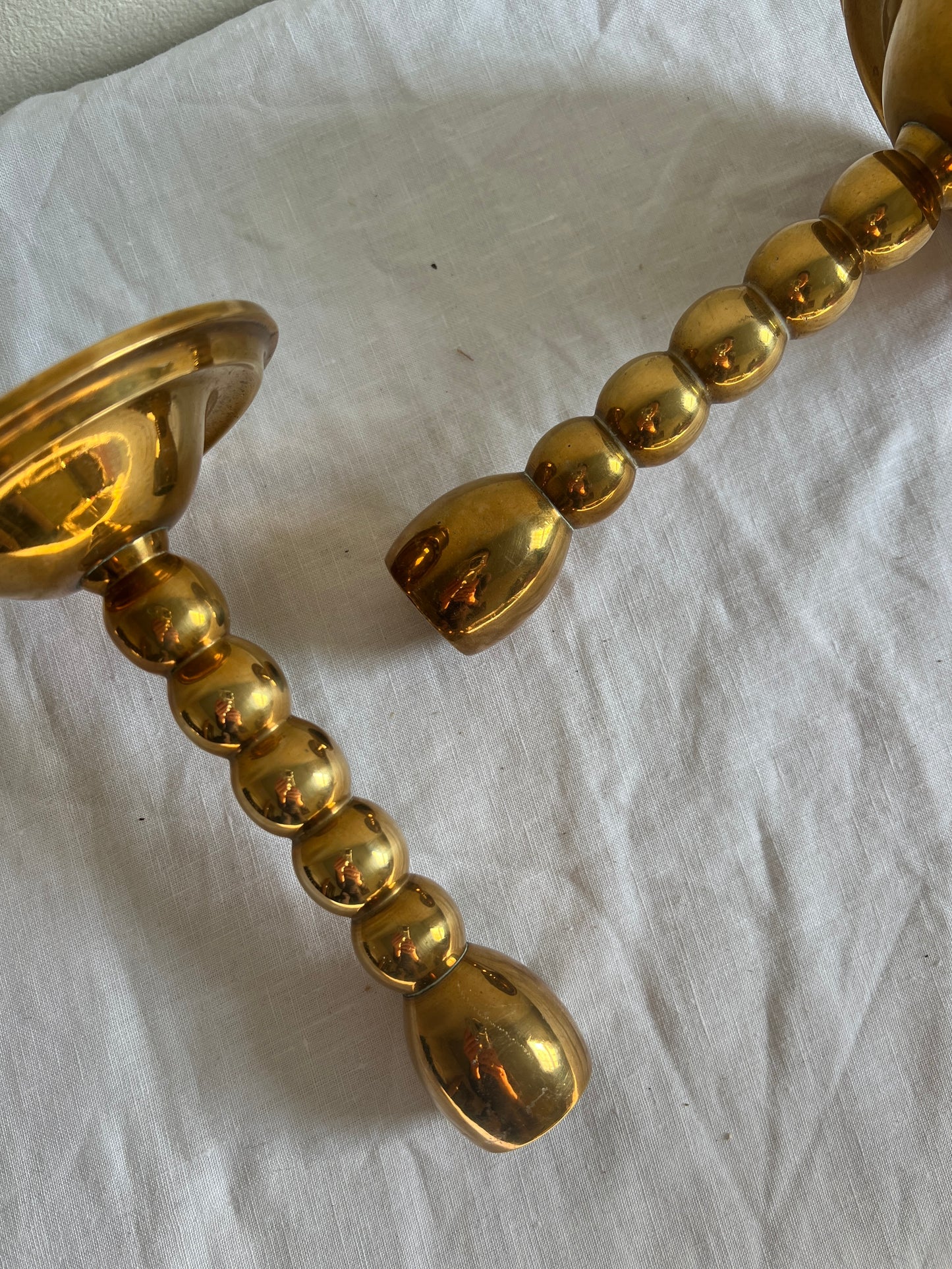 PAIR OF BRASS BOBBIN CANDLESTICKS