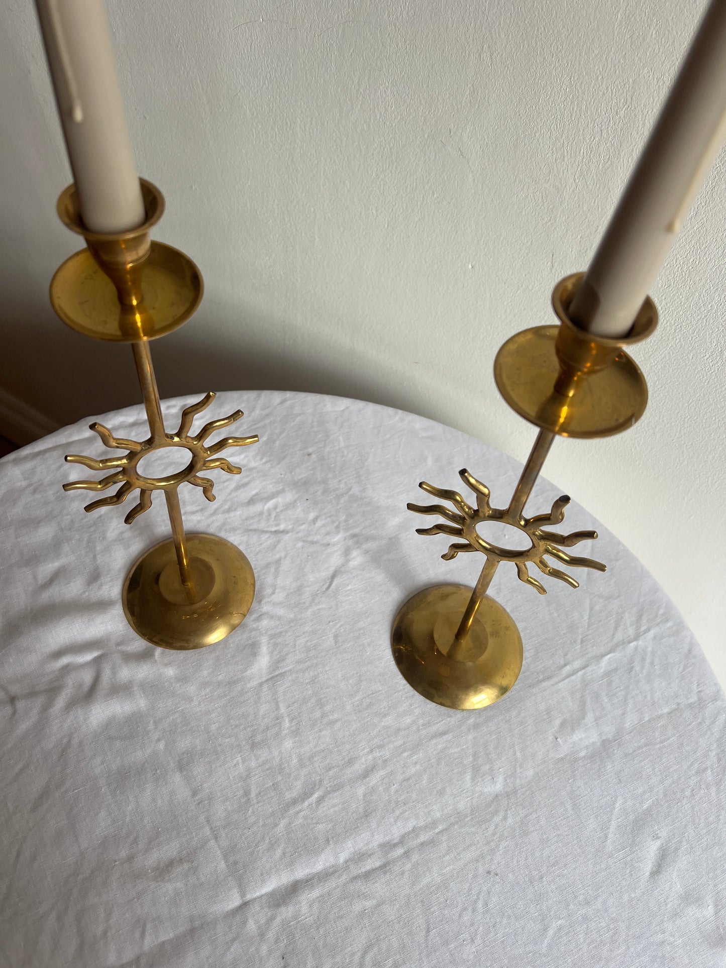PAIR OF BRASS SUN CANDLE HOLDERS