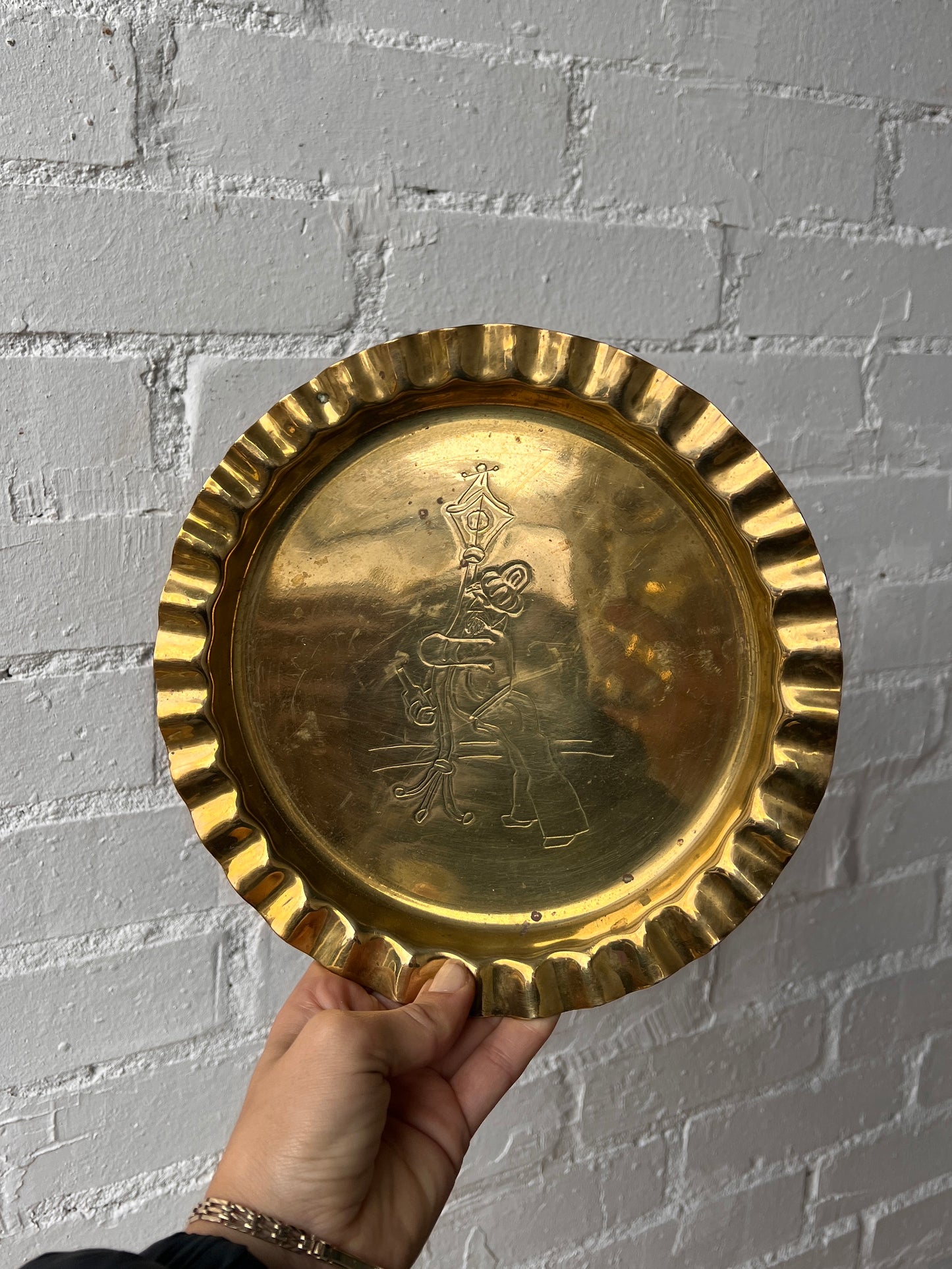 ‘TIPSY MAN' BRASS WALL PLATE