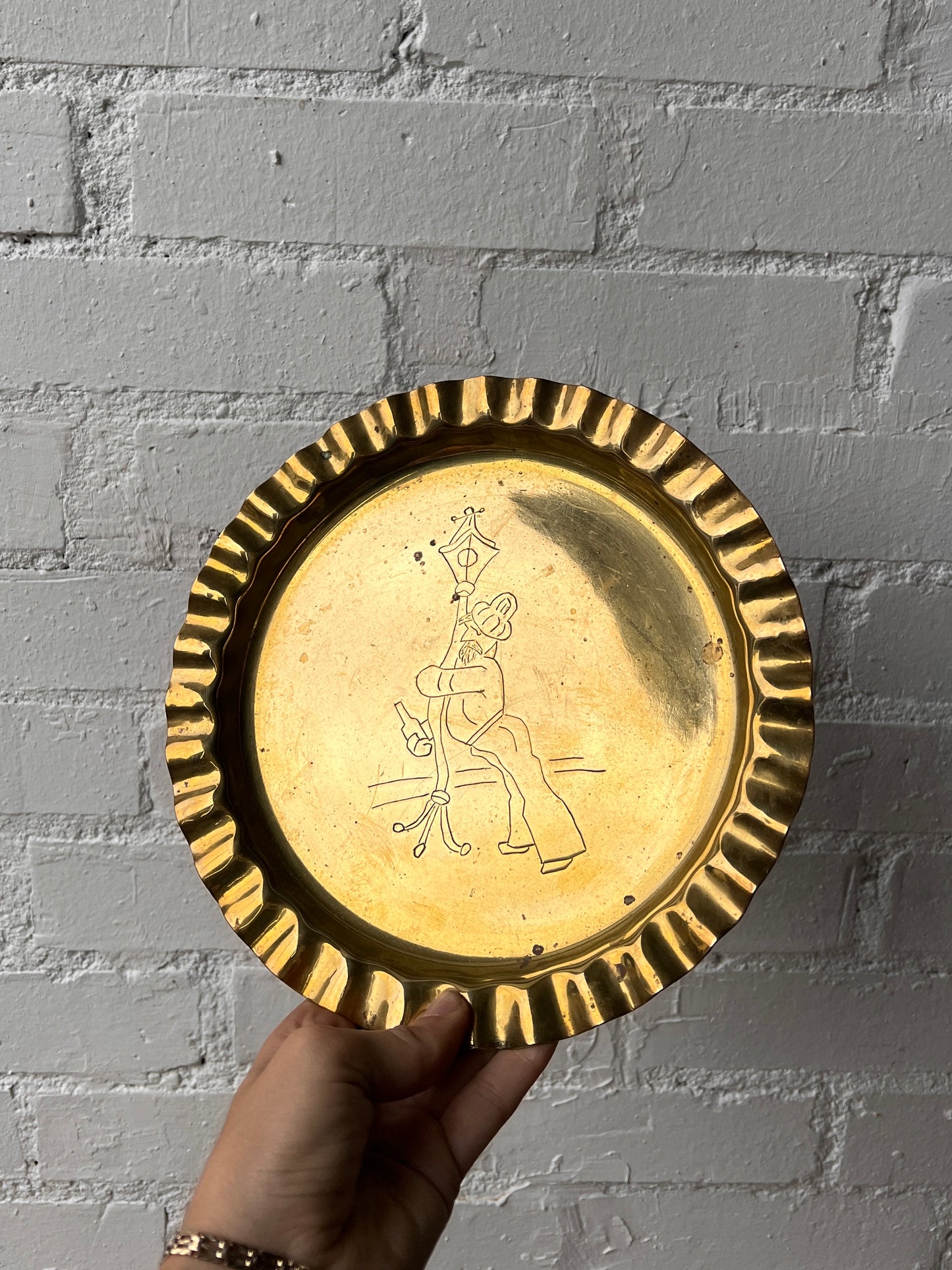 ‘TIPSY MAN' BRASS WALL PLATE