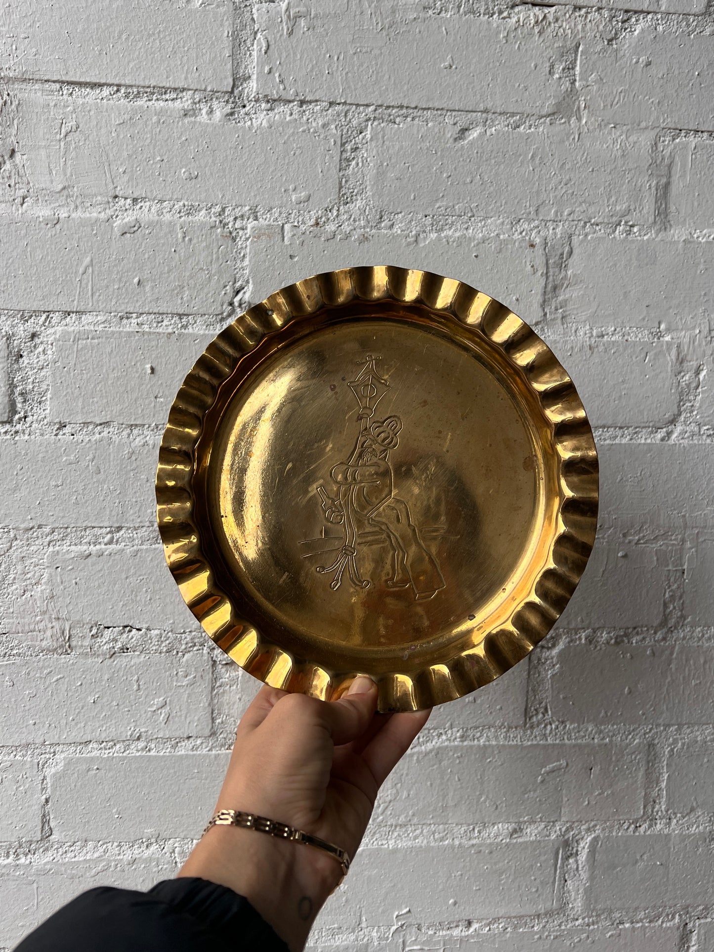 ‘TIPSY MAN' BRASS WALL PLATE