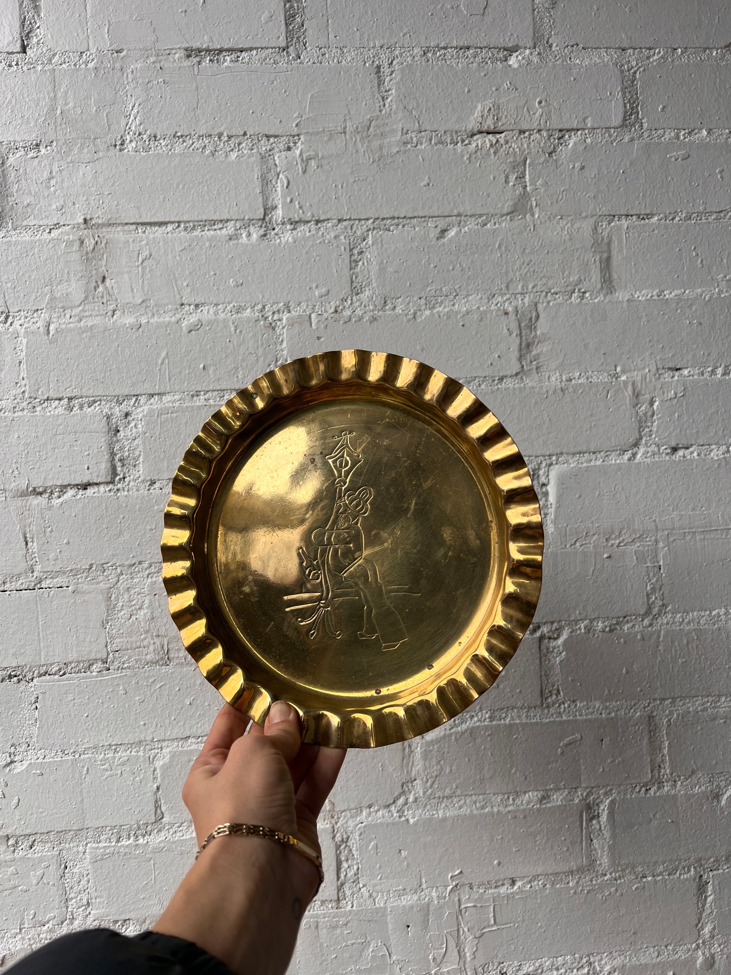 ‘TIPSY MAN' BRASS WALL PLATE