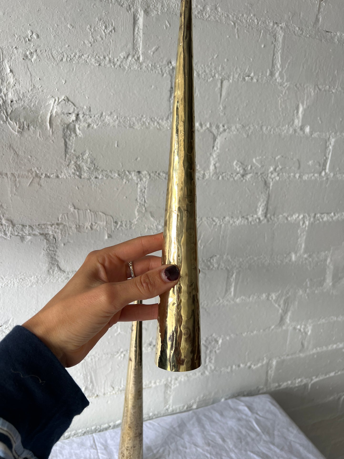 PAIR OF BRASS TALL CONES