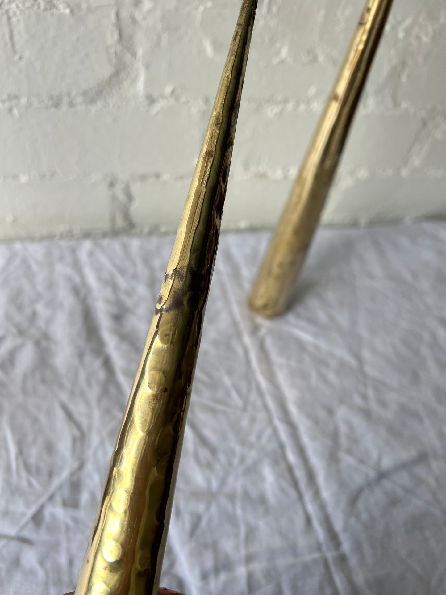 PAIR OF BRASS TALL CONES