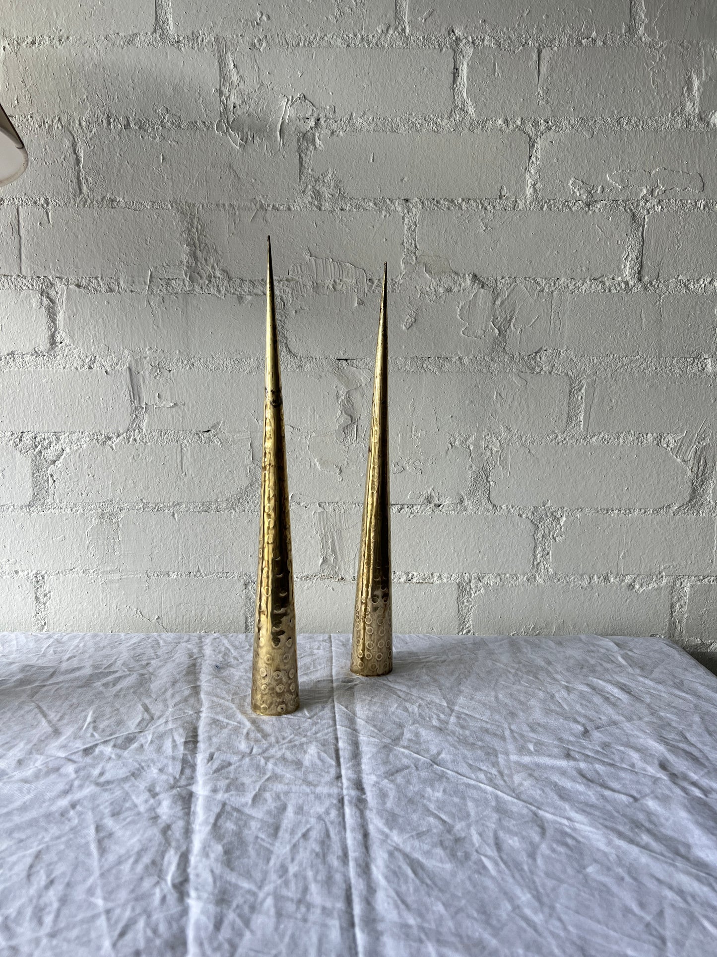 PAIR OF BRASS TALL CONES
