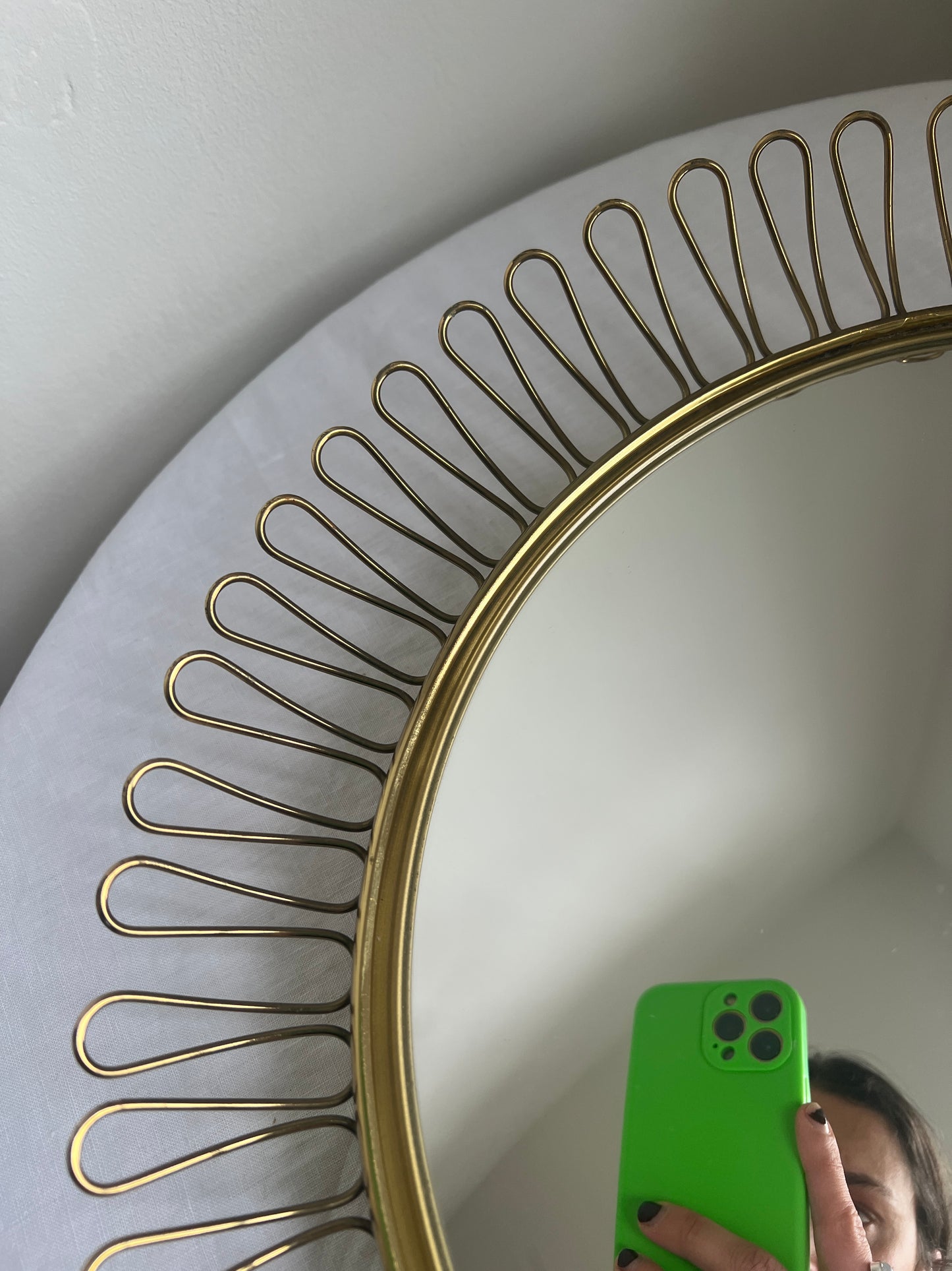 Circular brass convex mirror in the style of Josef Frank
