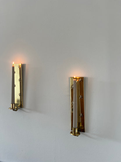 Pair of brass star sconces