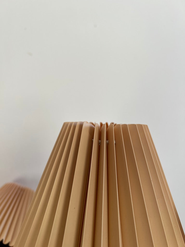 PAIR OF PINE WALL LIGHTS WITH PEACH PLEATED SHADES