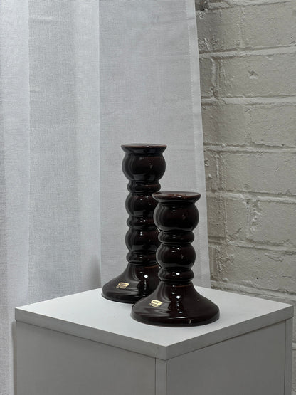 PAIR OF GLOSSY BROWN CANDLE STICKS