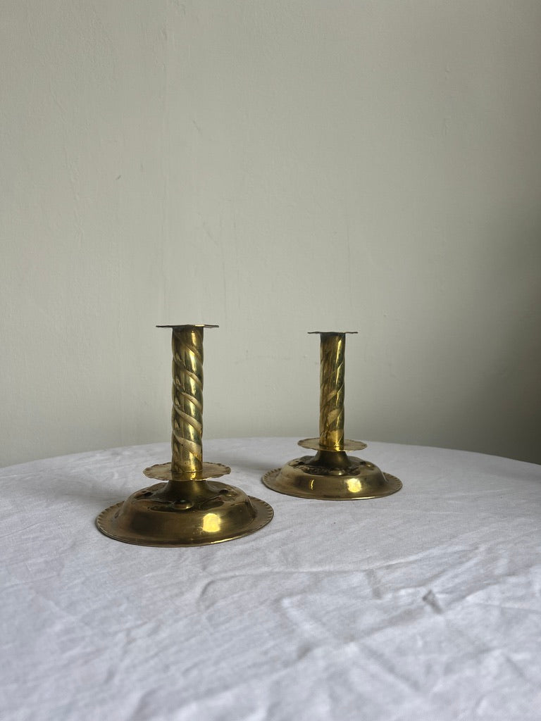 PAIR OF BRASS REPOUSSÉ CANDLE STICKS