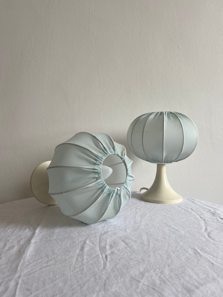 Pair of baby blue cocoon bedside lights