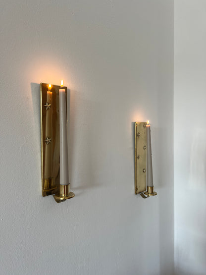 Pair of brass star sconces