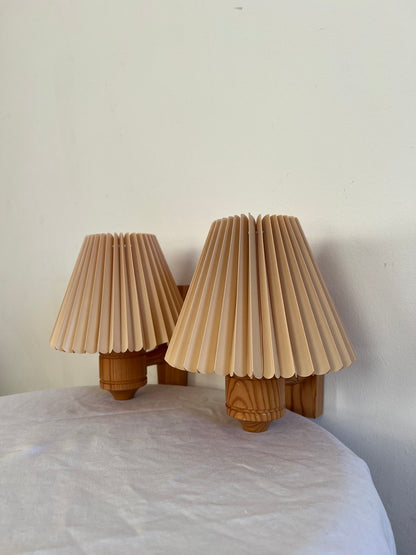 PAIR OF PINE WALL LIGHTS WITH PEACH PLEATED SHADES