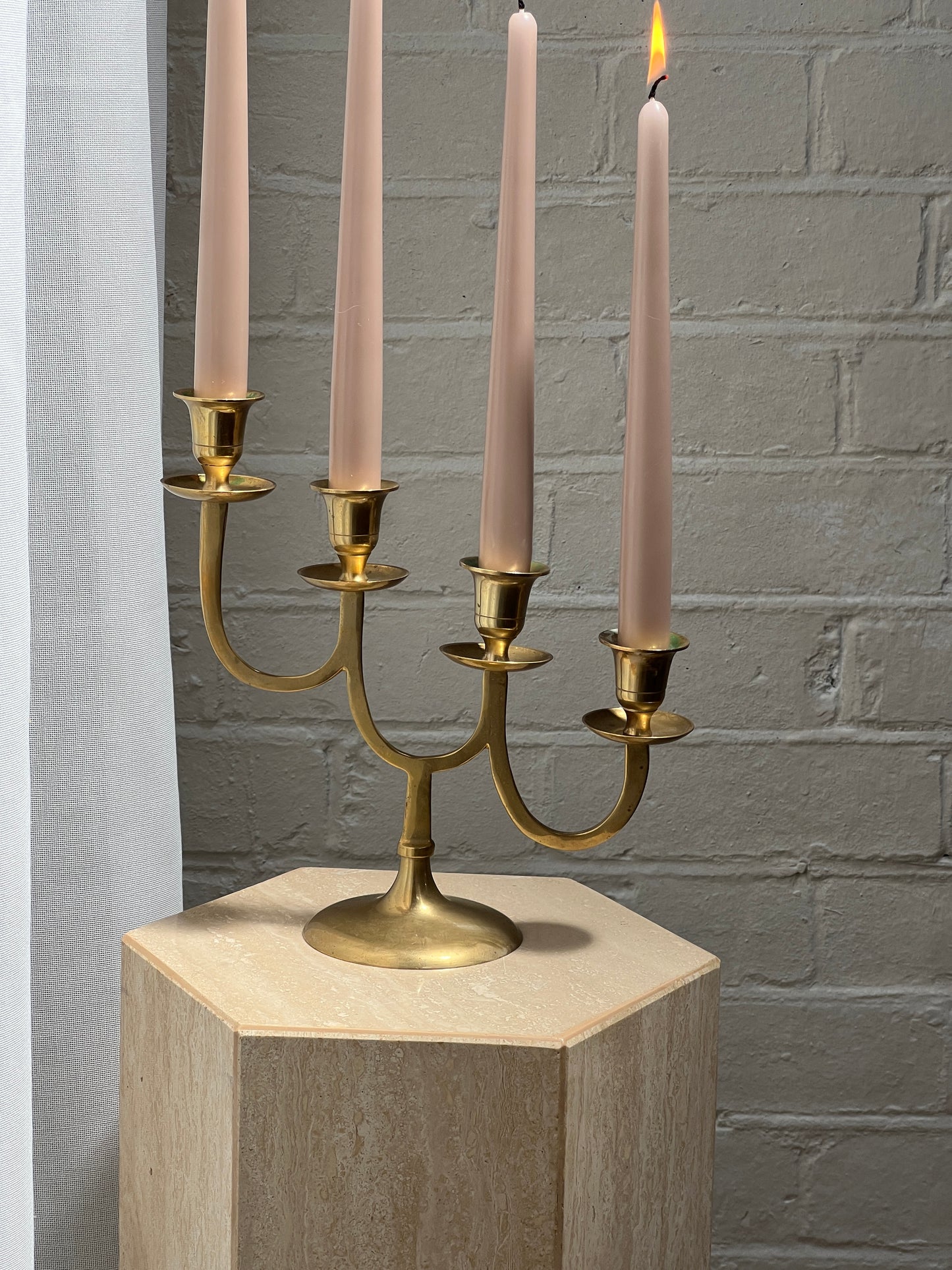 STAGGERED BRASS CANDLE HOLDER