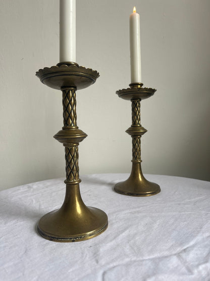 Pair of vintage tall brass candle sticks