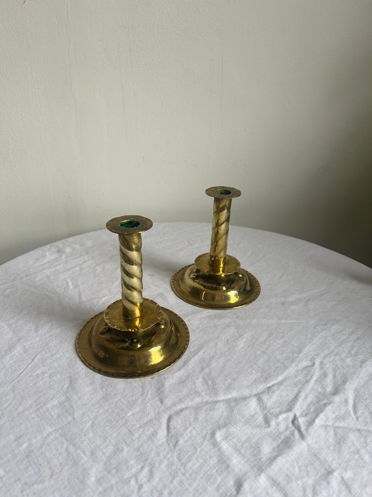 PAIR OF BRASS REPOUSSÉ CANDLE STICKS