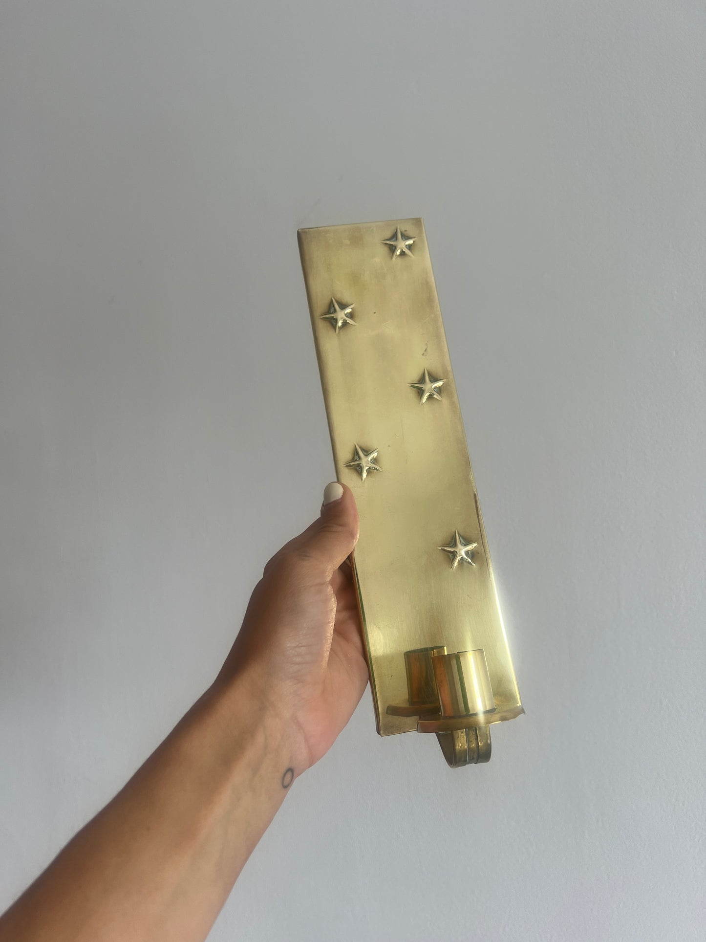 Pair of brass star sconces
