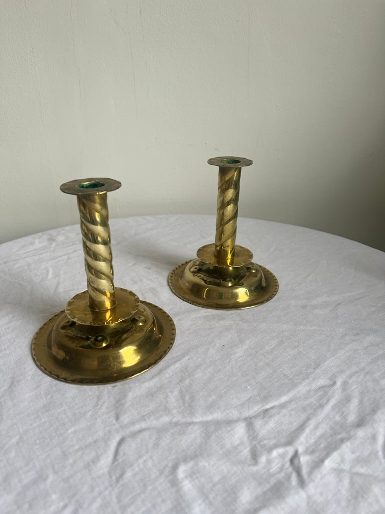 PAIR OF BRASS REPOUSSÉ CANDLE STICKS