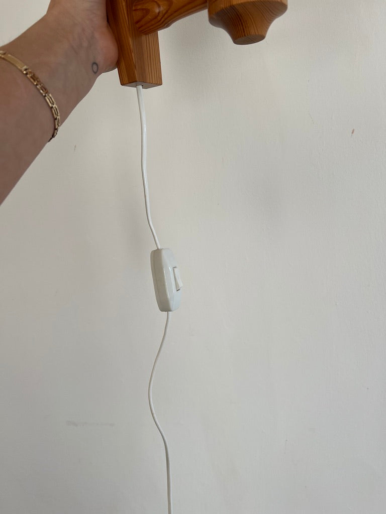 PAIR OF PINE WALL LIGHTS WITH PEACH PLEATED SHADES