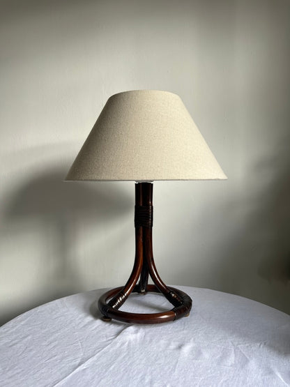 Mid Century Swedish rattan circular based lamp with linen shade