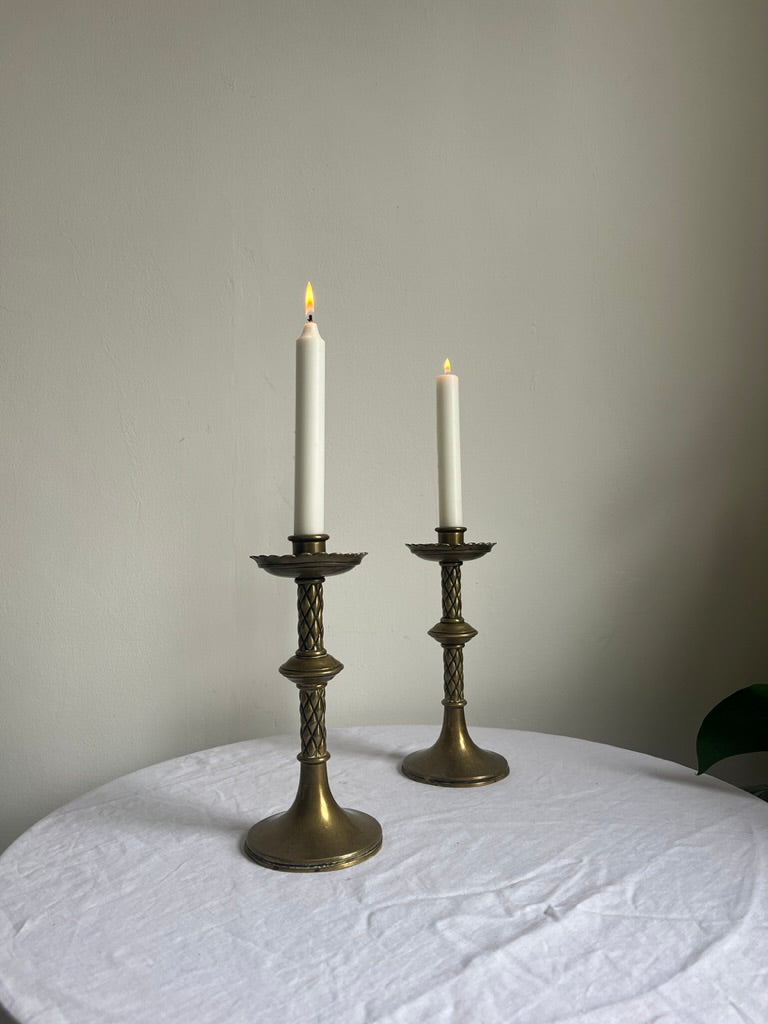Pair of vintage tall brass candle sticks